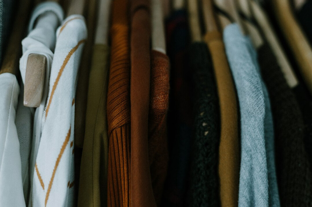 organized closet with folded clothes